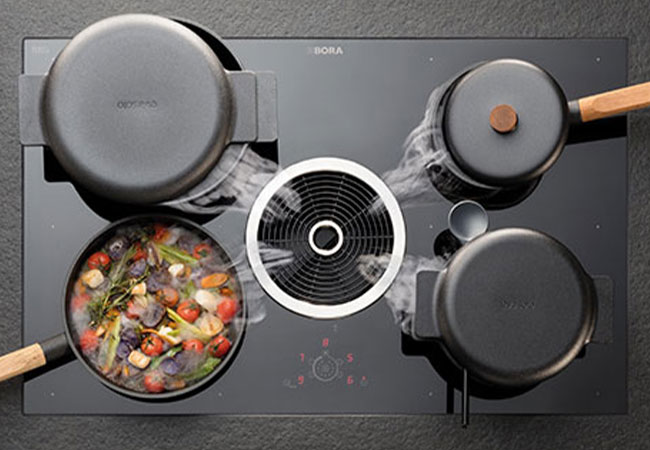 Ein Muldenlüfter/Kochfeldabzug der Firma Bora. Diese Varianten sind besonders moderne Dunstabzüge.