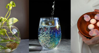 Deko mit Wasser in drei Varianten, eine Pflanze wächst in einem Glas, ein buntes Wasserglas wird befüllt, eine Holzschale mit Wasser, Kerzen und Blüten.